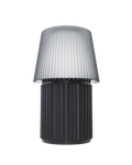 Kono Graphite table lamp by Lempori with a ribbed fluted base and matching shade on a white background.