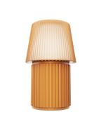 Kono Honey table lamp by Lempori with a ribbed fluted base and matching shade on a white background.