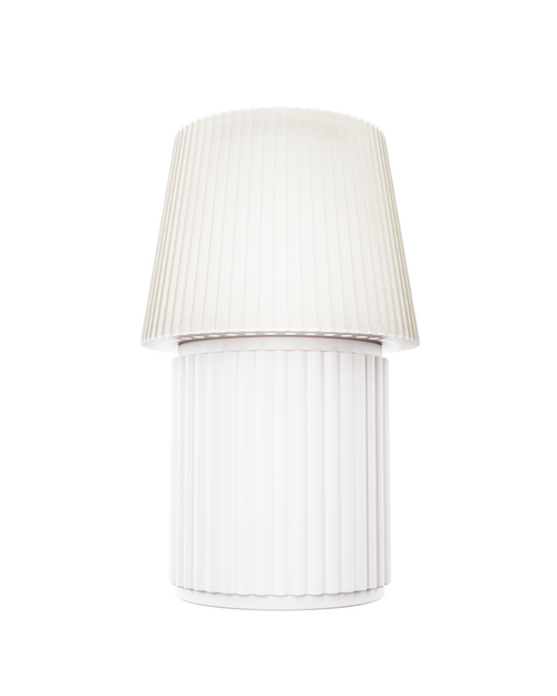 Kono Ivory table lamp by Lempori with a ribbed fluted base and matching shade on a white background.