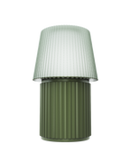 Kono Moss table lamp by Lempori with a ribbed fluted base and matching shade on a white background.