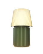 Kono Moss table lamp by Lempori illuminated with warm white LED light on a white background.