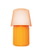 Kono Ochre table lamp by Lempori with a ribbed fluted base and matching shade on a white background.